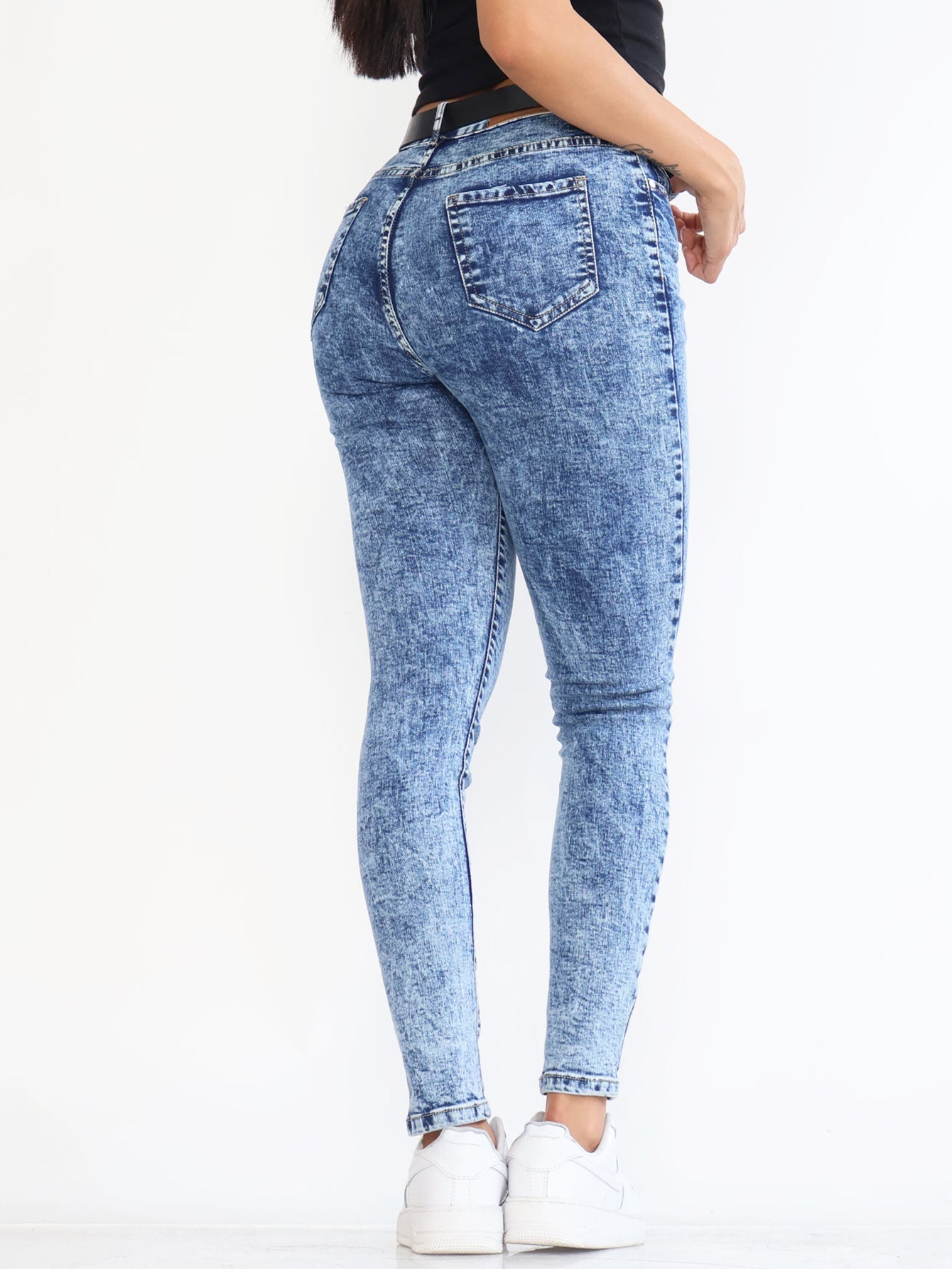 Jeans Ajustados de Mezclilla Desgastada - Corte Alto en Azul